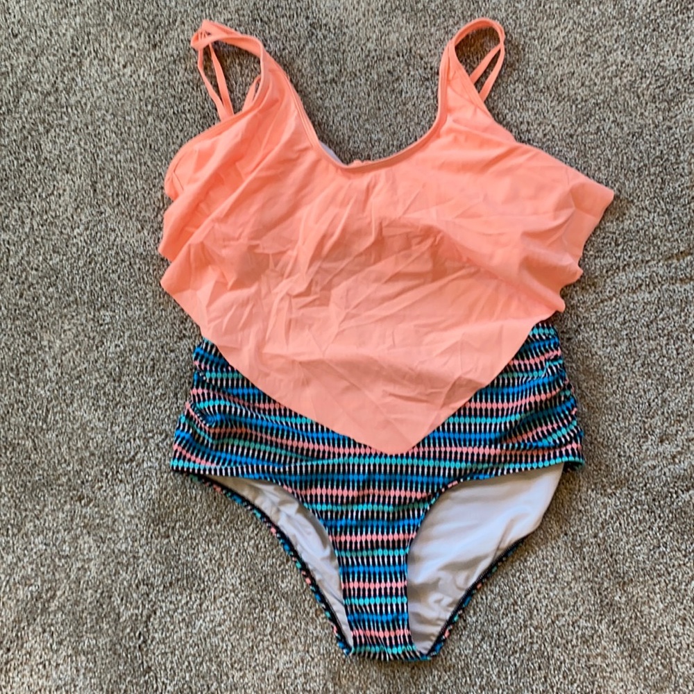 2 pc swimsuit. High bottoms, flowy top, tie close